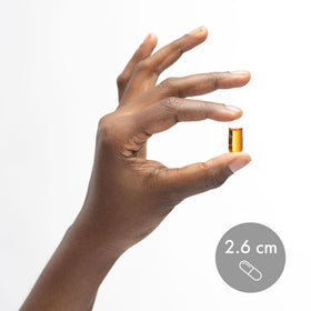 Dr. Mercola Huile de Saumon 3000 mg capsules en main