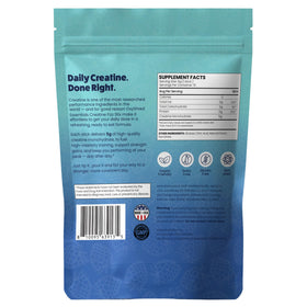 EHP Labs OxyShred créatine monohydrate sachets sur une table avec des haltères