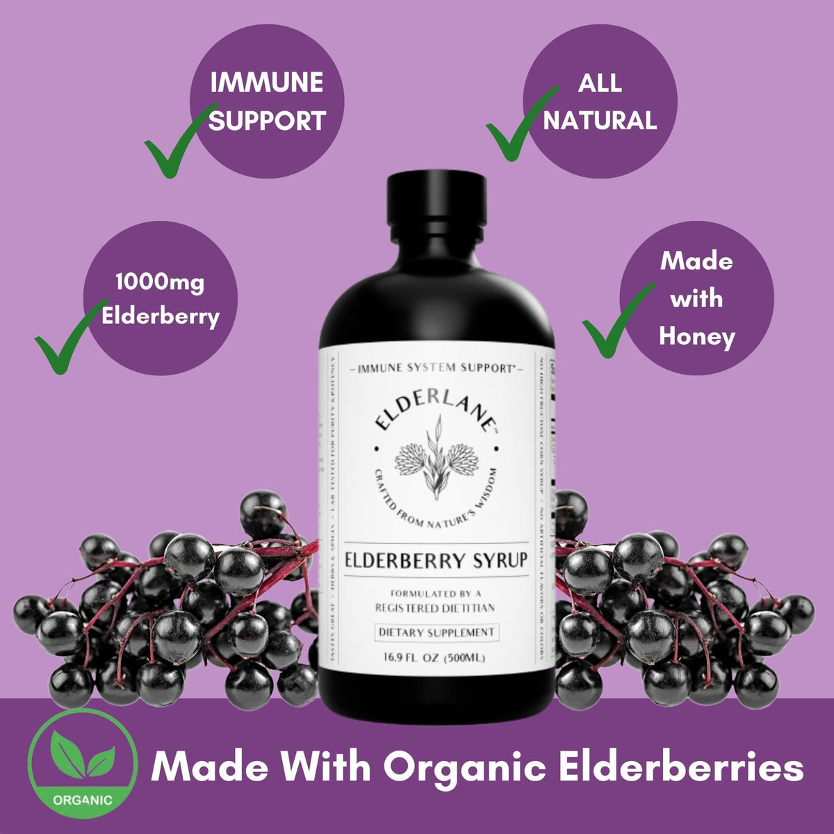 Elderlane Sirop de Sureau 16,9 oz sur une table avec des ingrédients naturels