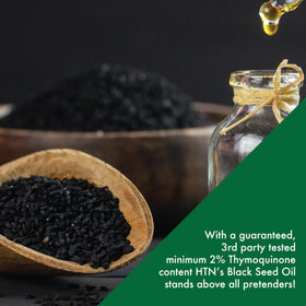 Emballage de l'huile de Nigelle Health Thru Nutrition avec étiquettes