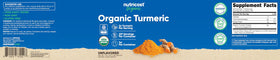 Emballage de la poudre de curcuma bio Nutricost sur une table