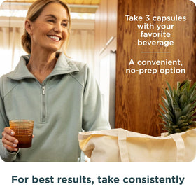 Emballage des capsules de magnésium Ancient Nutrition sur une table en bois