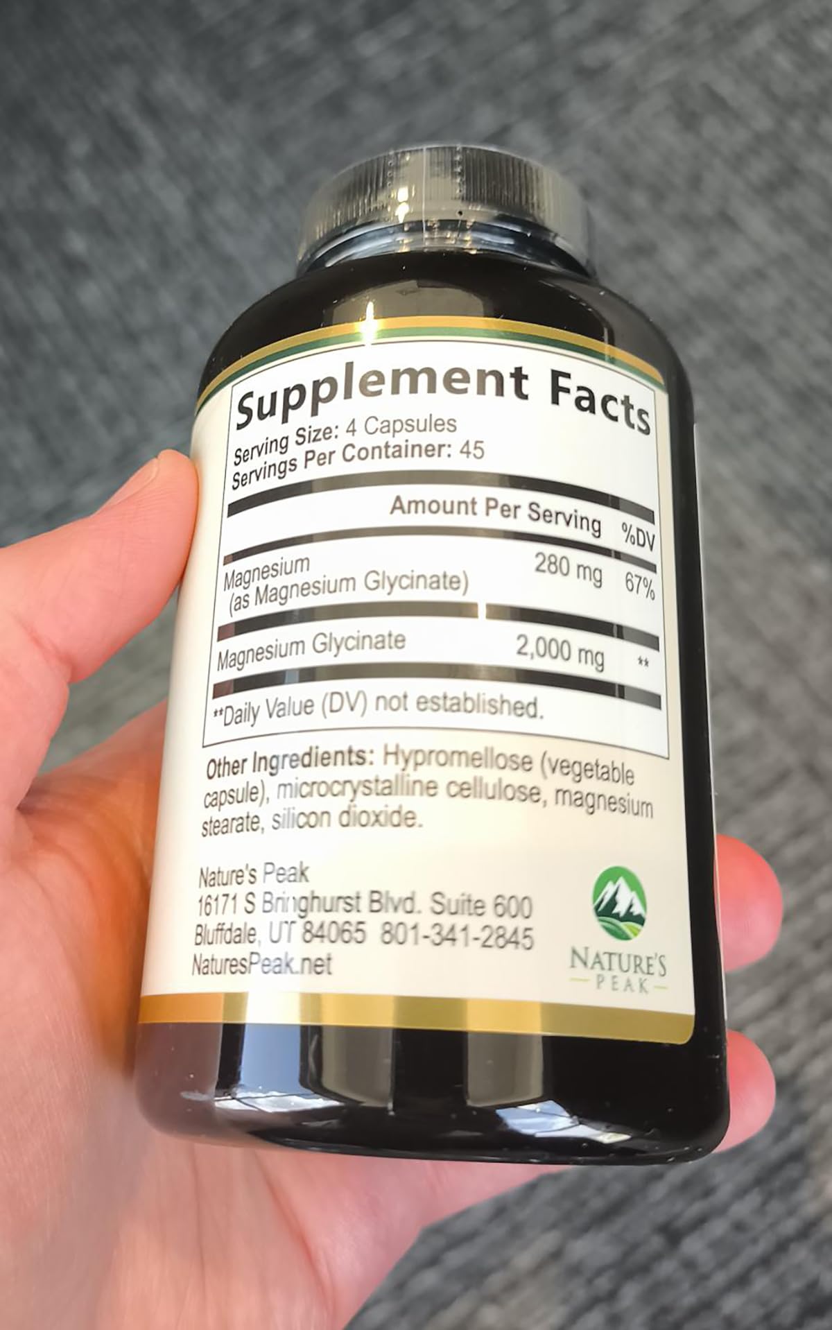 Emballage des capsules de Magnésium Glycinate Nature's Peak sur une table