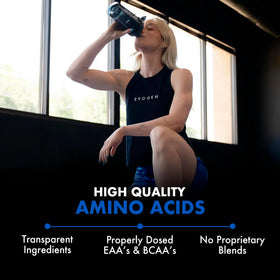 Evogen Amino K.E.M. EAA & BCAA BlackBerry Lemonade powder mixed in water