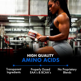 Evogen Amino K.E.M. EAA & BCAA Smashin' Passion Orange mixed in a glass