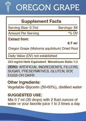 Extrait de raisin d'Oregon dans un verre avec des raisins frais