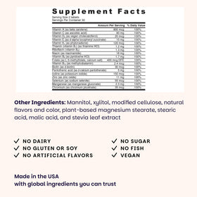 EZ Melts Multivitamine sans Fer sur une table avec des fruits