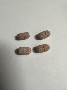 Ferretts Complément Alimentaire en Fer 106mg prise d'une pilule