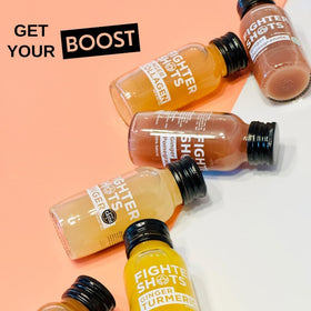 Fighter Shots Ginger 12 Pack en gros plan sur les bouteilles