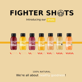 Fighter Shots Shot de Gingembre sur fond de fruits frais