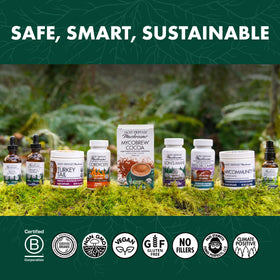 Flacon d'extrait de Chaga Host Defense sur une table en bois