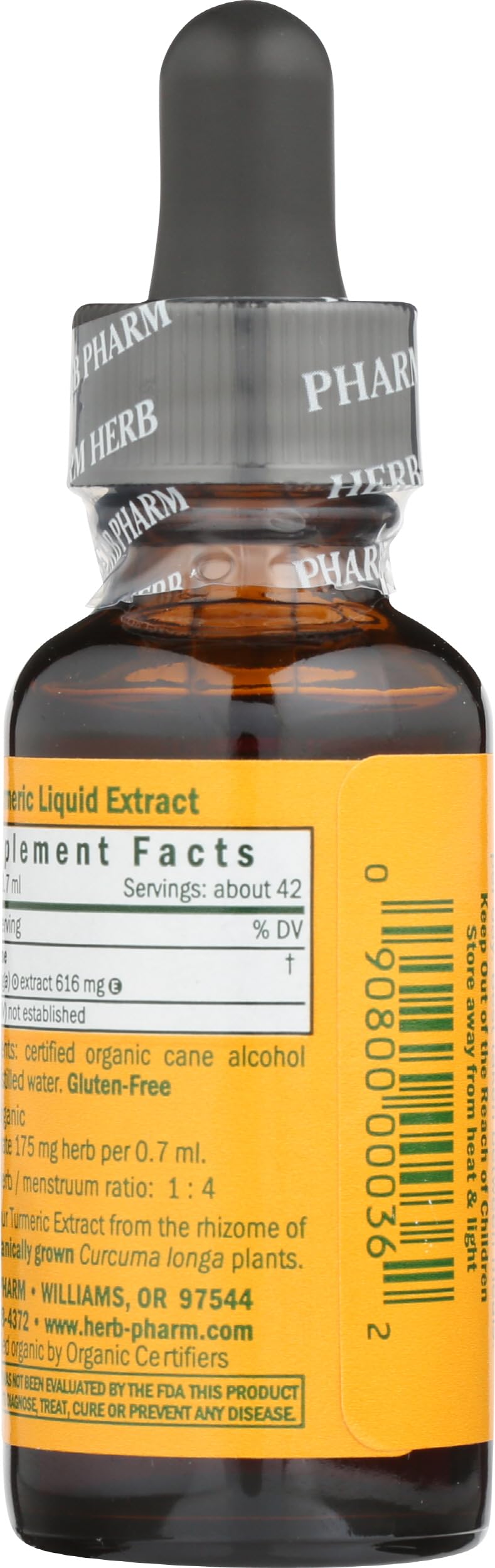 Flacon d'extrait de curcuma bio sur fond blanc