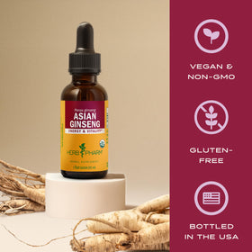 Flacon d'extrait de ginseng asiatique Herb Pharm sur une table en bois