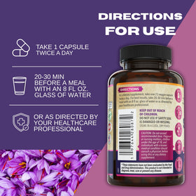 Flacon d'extrait de safran pur WHOLE WORLD WELLNESS avec des gélules à côté