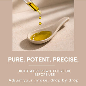 Flacon d'huile d'origan AROMAVITA en milieu naturel