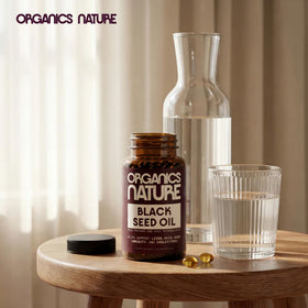 Flacon d'huile de graines noires ORGANICS NATURE avec gélules à côté