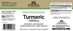 Flacon de 60 capsules de curcuma Windmill sur une table