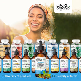 Flacon de 60 ml de Wild & Organic avec gouttes en cours d'utilisation