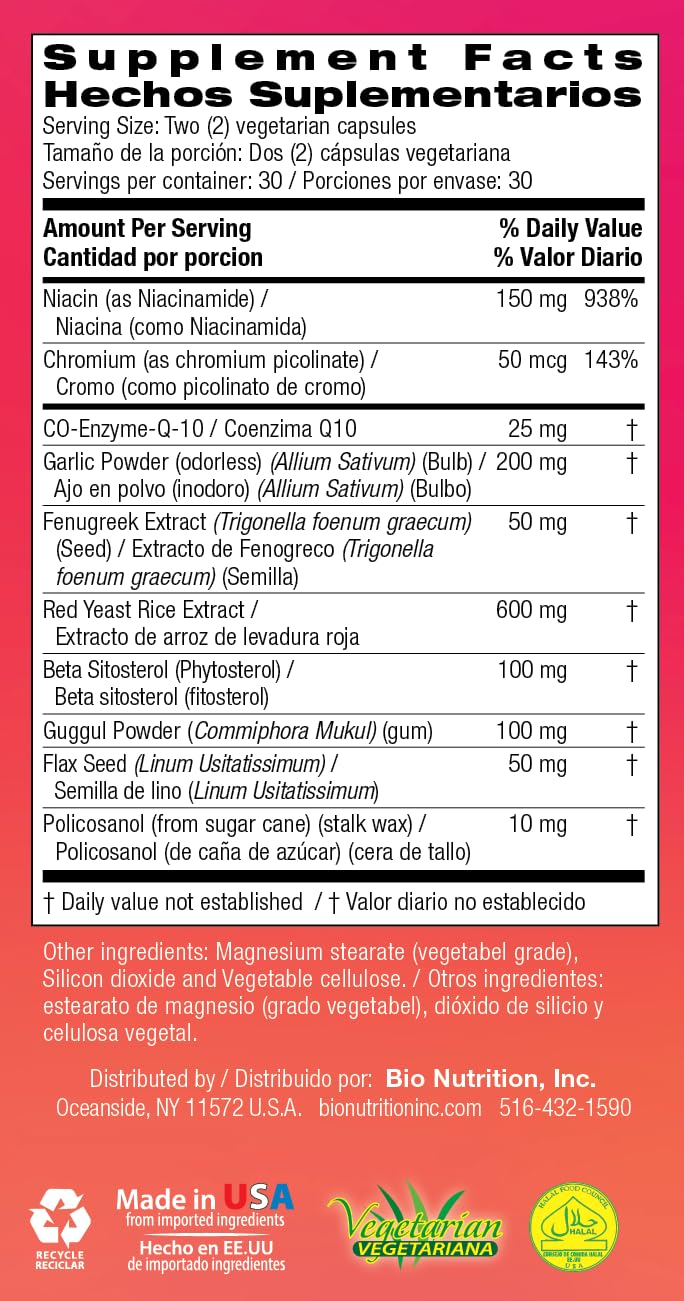 Flacon de capsules Bio Nutrition Cholesterol Wellness sur une table en bois