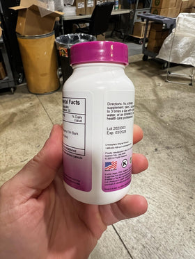 Flacon de Capsules de Bouleau Glissant sur un fond neutre
