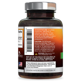 Flacon de capsules de cannelle de Ceylan bio ouvert avec capsules