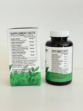 Flacon de capsules Wild & Organic sur une surface en marbre