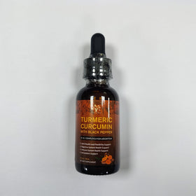 Flacon de complément alimentaire curcuma bio avec dose de gouttes