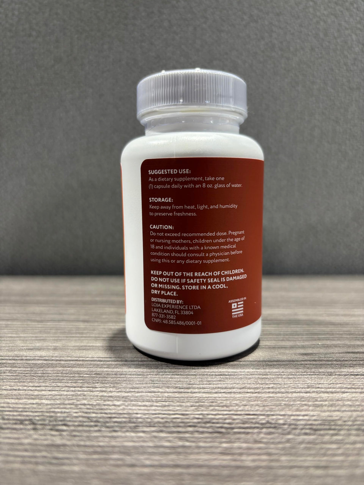 Flacon de Flexi Move avec une capsule à côté