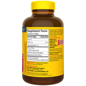 Flacon de gélules Omega 3-6-9 Nature Made sur une table en bois
