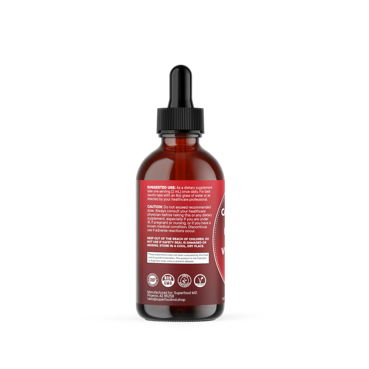 Flacon de gouttes Superfood MD au piment de cayenne sur un fond en bois
