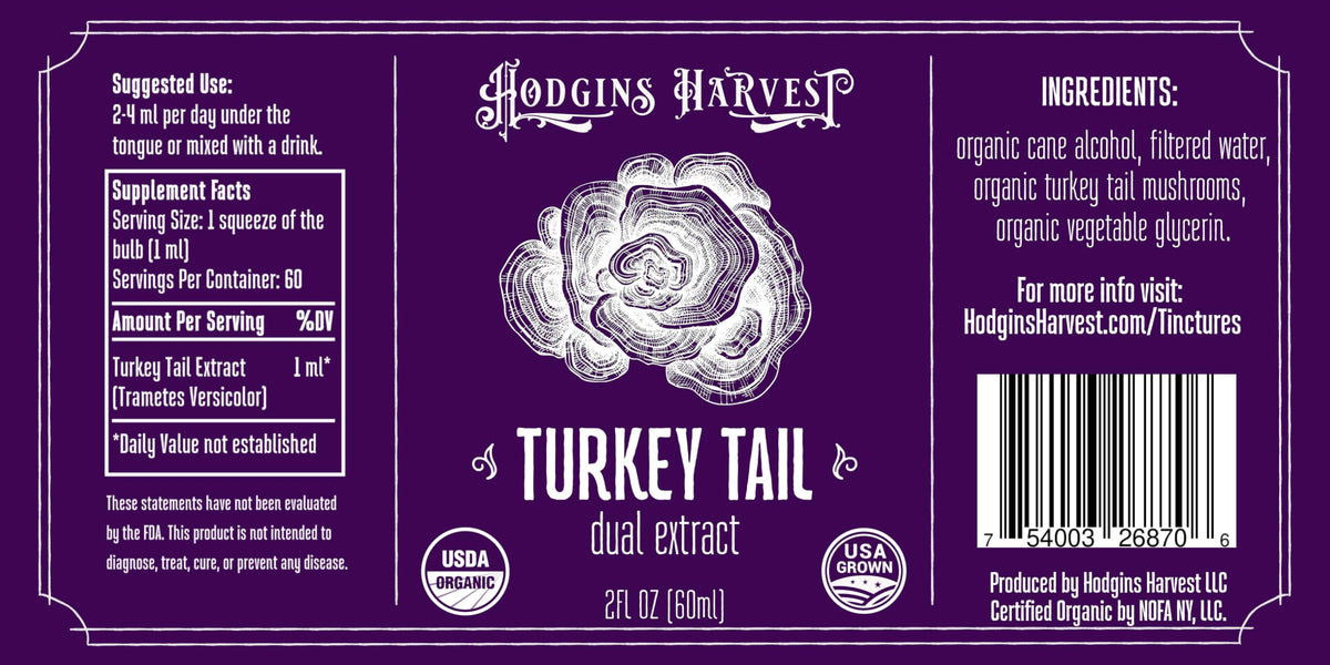 Flacon de Hodgins Harvest Extrait de Champignon Turkey Tail sur une table en bois