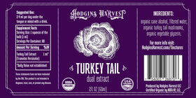 Flacon de Hodgins Harvest Extrait de Champignon Turkey Tail sur une table en bois