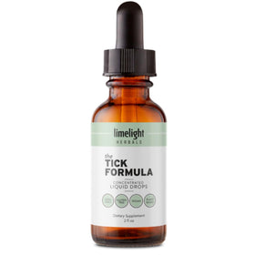 Flacon de la Formule Anti-Tiques LIMELIGHT HERBALS posé sur une table en bois