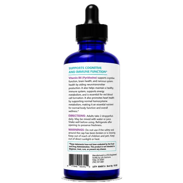 Flacon de Life Solutions B6 liquide 25 mg sur une table