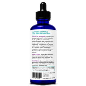 Flacon de Life Solutions B6 liquide 25 mg sur une table
