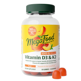 Flacon de MegaFood Vitamine D3 K2 60 gummies saveur pêche