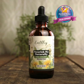Flacon de multivitamine liquide Earthley Wellness sur une table