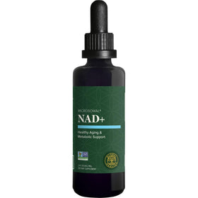 Flacon de NAD+ Global Healing Center posé sur une surface en bois