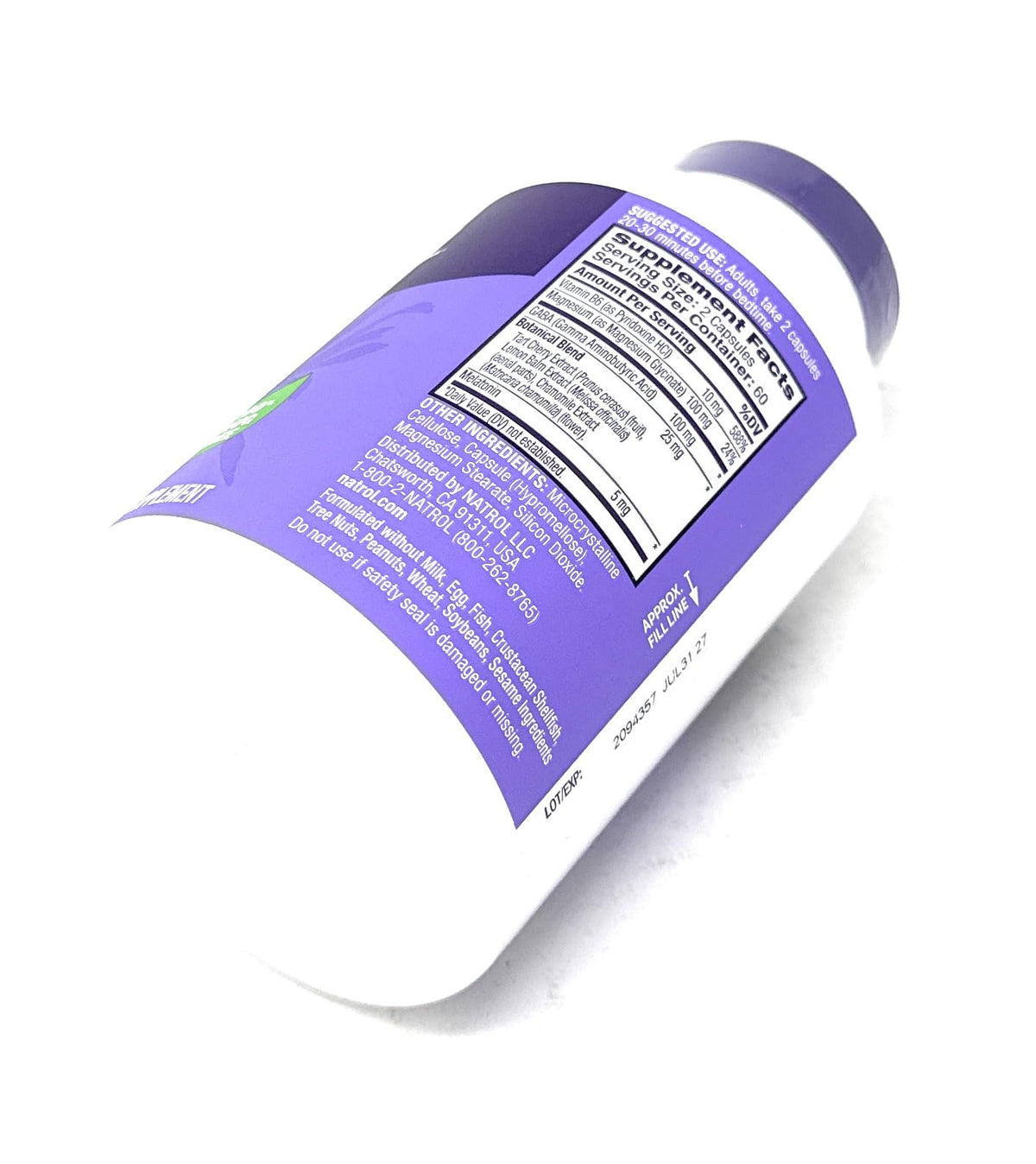 Flacon de Natrol Sommeil & Récupération avec arrière-plan naturel