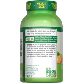 Flacon de Nature's Truth avec églantier, sur une table en bois