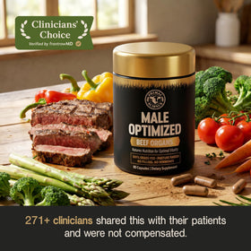 Flacon de Primal Science Complément Alimentaire sur une table en bois
