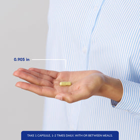 Flacon de Pure Encapsulations Ester-C & Flavonoids sur un fond neutre