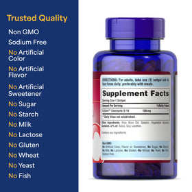 Flacon de Puritan's Pride Coenzyme Q10 sur une table en bois