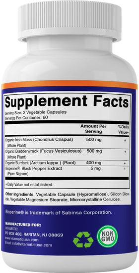 Flacon de Vitamatic avec capsules sur un fond neutre