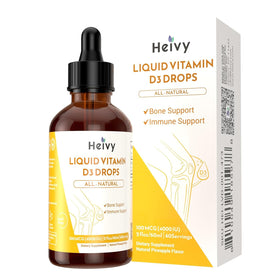 Flacon de vitamine D Heivy avec une cuillère doseuse sur une table