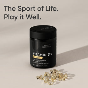 Flacon de Vitamine D3 1000iu ouvert avec gélules visibles