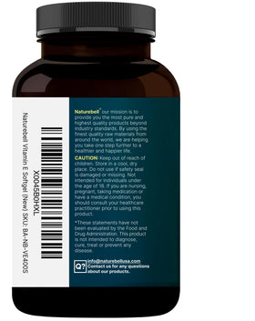 Flacon de vitamine E NatureBell sur une table en bois