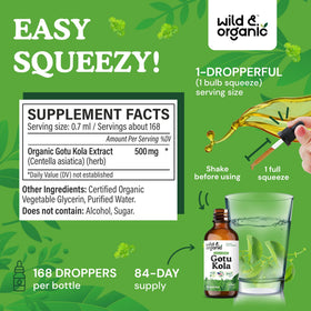 Flacon de Wild & Organic Gotu Kola sur un plan de travail en bois