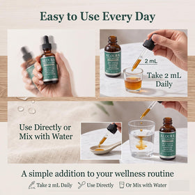 Flacon de XKHZRX Aloura Liver Restore Drops avec compte-gouttes en main