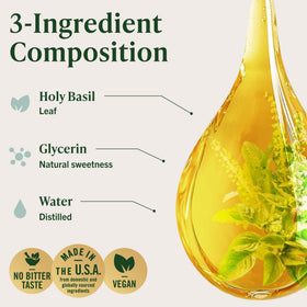 Flacon HERBAMAMA Basilic Sacré sur une table en bois